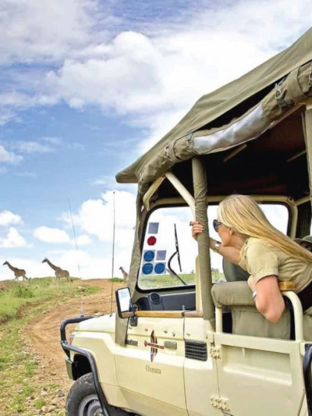 Rent a driver in Tanzania - Cruiser with Pop-up Roof photo1